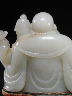 和田玉弥勒佛摆件,玉质温润,雕工细致,童子环绕,造型饱满,寓意美好